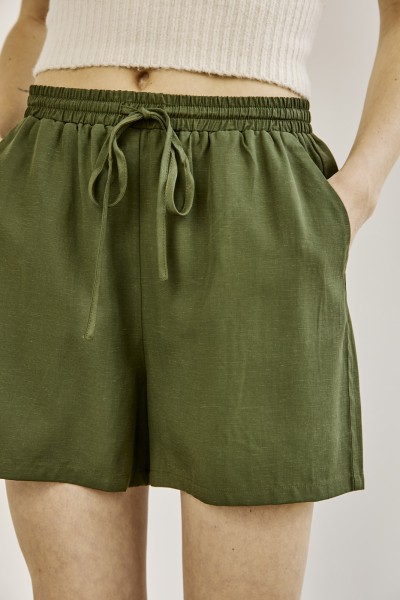 WithBlack: Modell 'Wblallison String Shorts - Bronze Green'